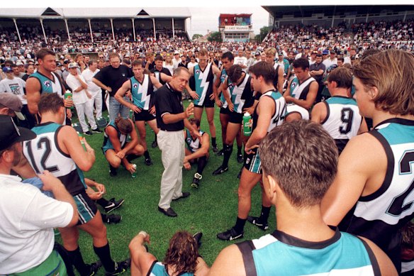 Inaugural Port Adelaide coach John Cahill always had plenty for his runners to pass on to players … and umpires.