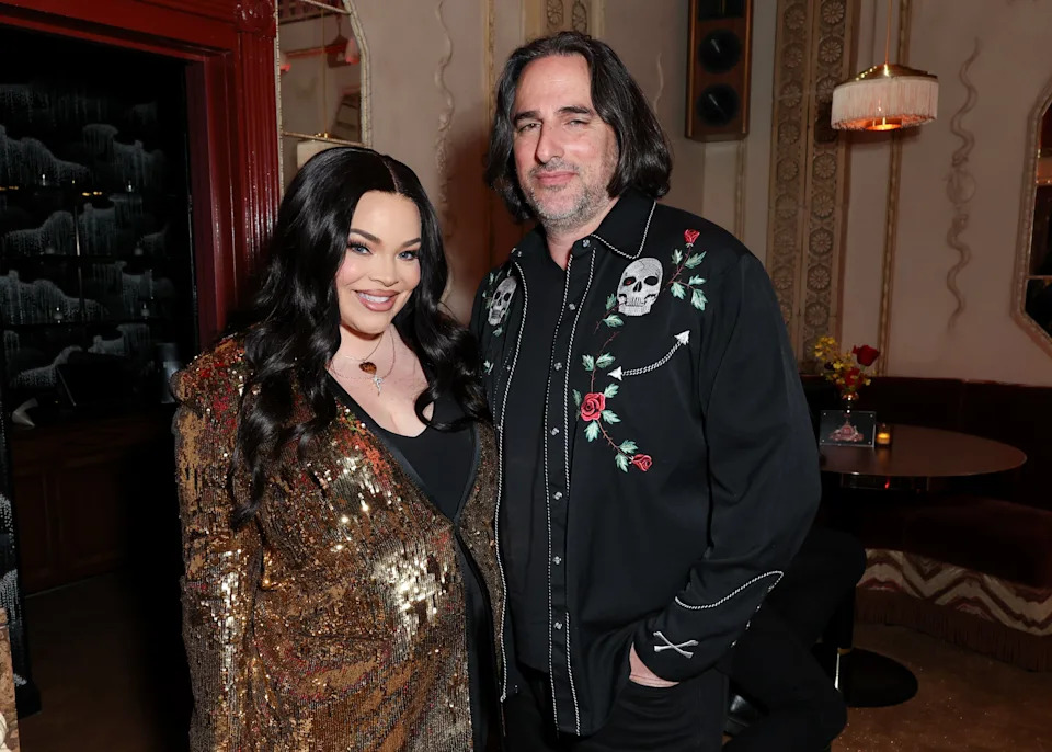Trisha Paytas poses alongside her husband, Moses Hacmon. / JC Olivera / Variety via Getty Images