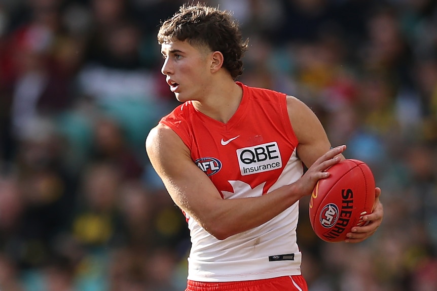 Harry Kyle playing for the Swans
