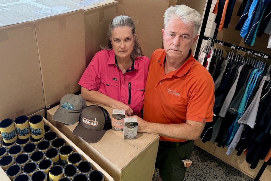 man and woman with merchandise