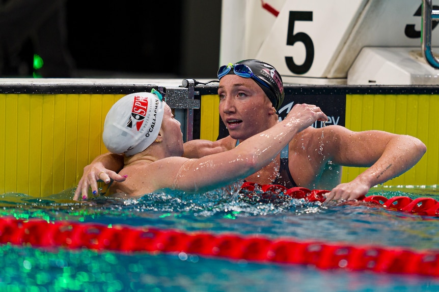 Lani Pallister hugs Mollie O'Callaghan after the 200m freestyle at the Australian Swimming Trials.