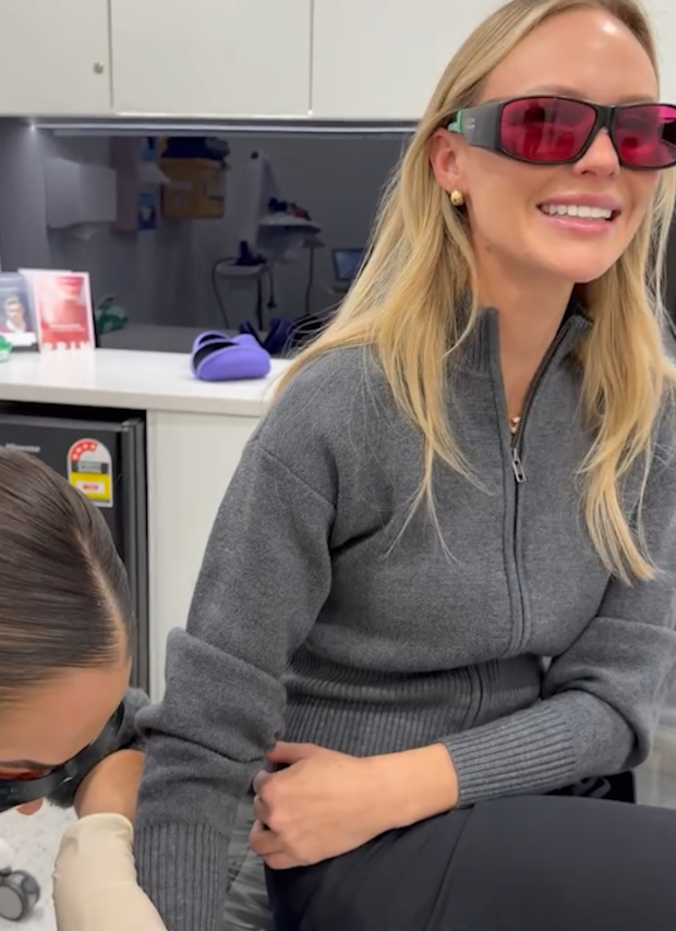 Jules Neale has her L tattoo laser removed from her wrist