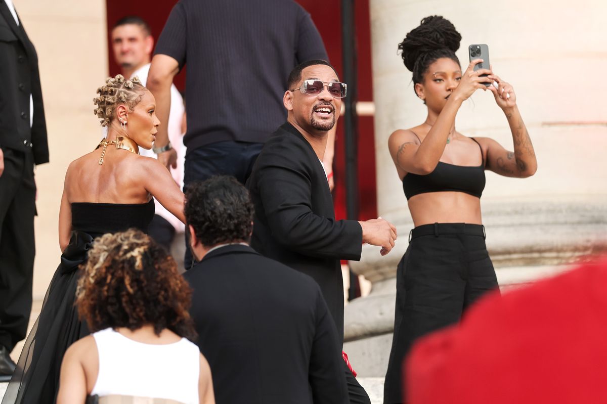 The Smith family steps out in coordinated black ensembles for Jaden Smith's Christian Louboutin Spring/Summer 2027 presentation at Paris Fashion Week.