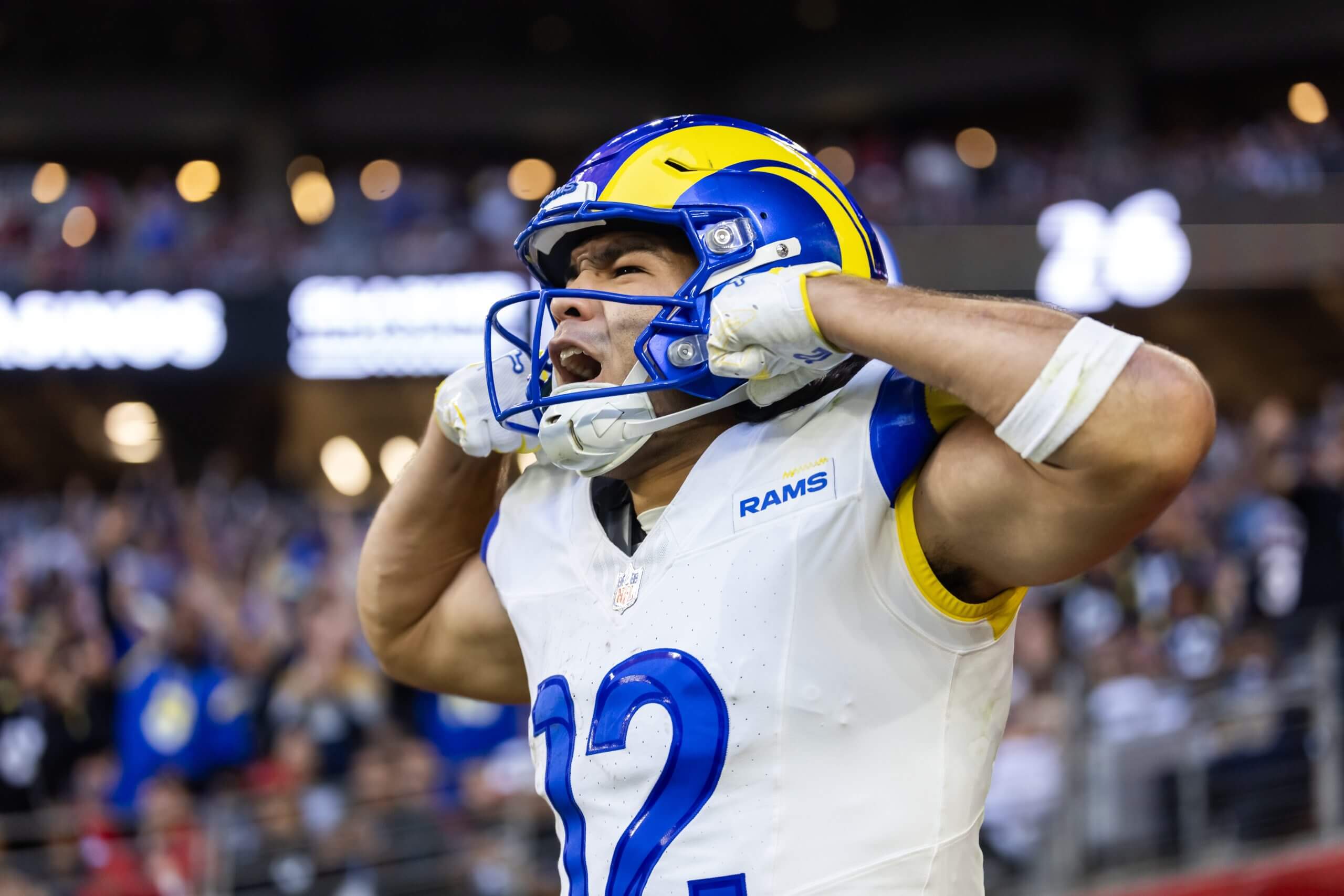 Los Angeles Rams wide receiver Puka Nacua (12) celebrates after scoring a touchdown against the Arizona Cardinals during the second half at State Farm Stadium. 