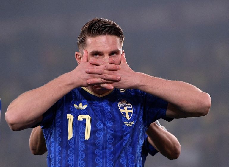 Viktor Gyokeres celebrates with his hands covering his mouth