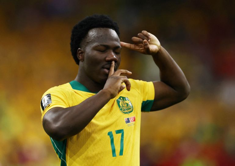 Nestory Irankunda puts a finegr to his lips and another to his temple after scoring against Turkiye