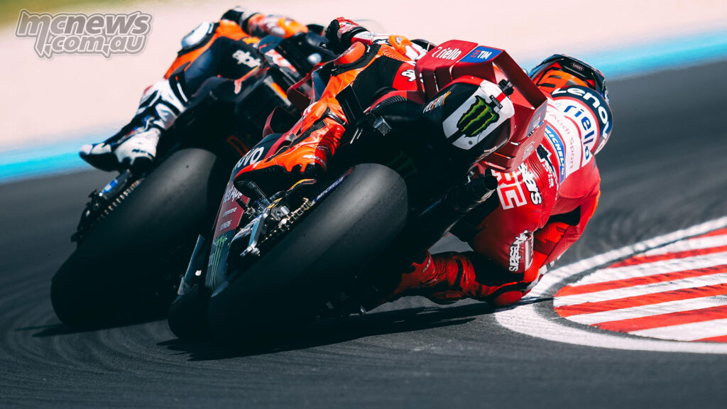 Pedro Acosta leads Marc Marquez through a right-hand corner during the Hungarian MotoGP race.