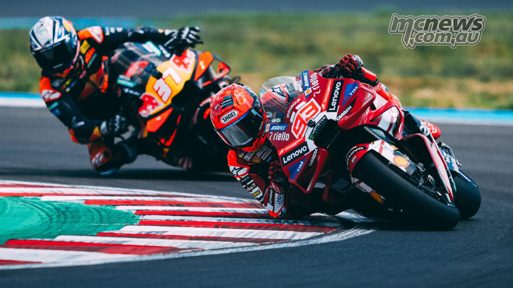 Marc Marquez leads Pedro Acosta through a left-hand corner during the Hungarian MotoGP race.
