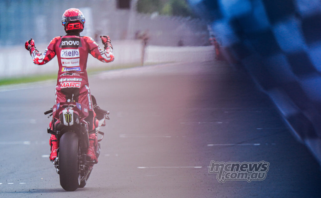 Marc Marquez celebrates on his Ducati after winning the Hungarian MotoGP race.