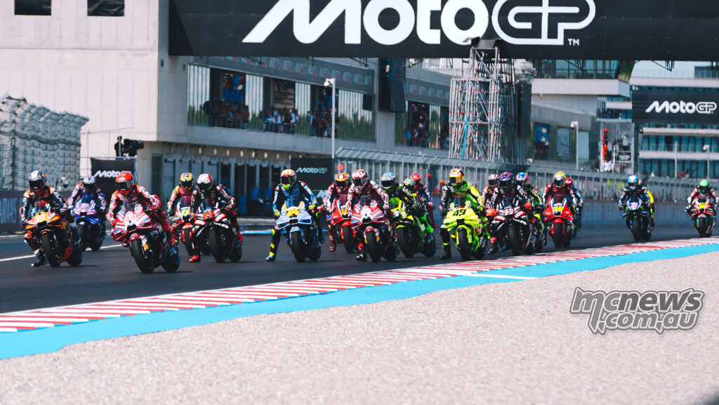 MotoGP riders accelerate away from the start at the Hungarian Grand Prix.