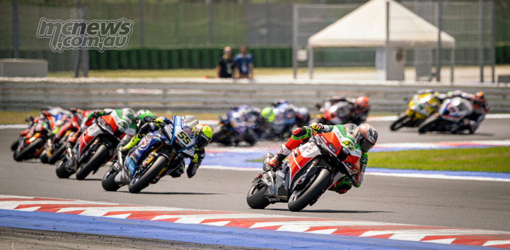 Axel Bassani and Andrea Locatelli in the WorldSBK pack during Sunday racing at Misano.