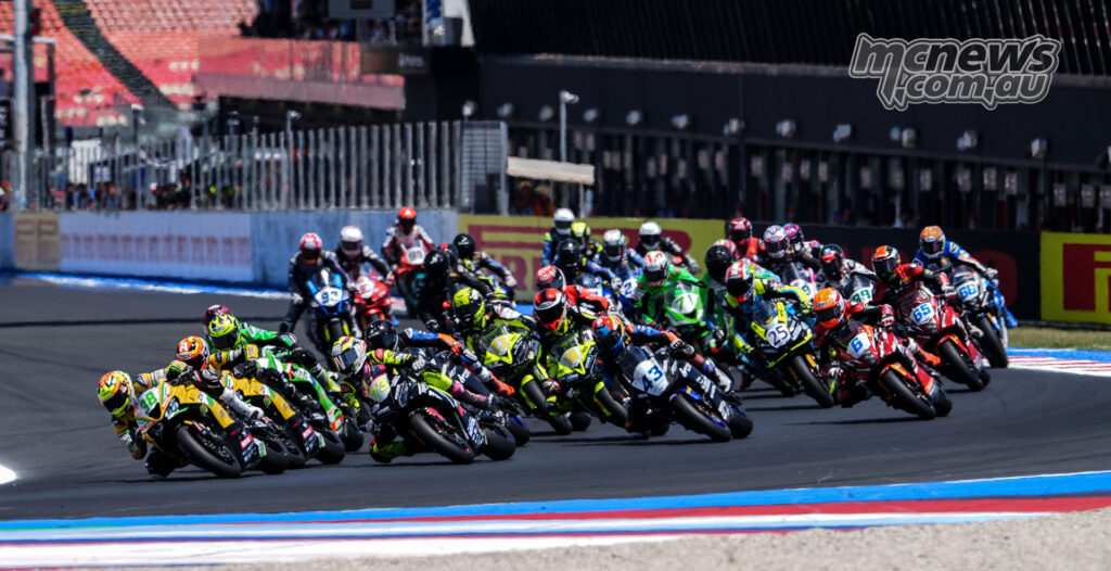 WorldSPB riders packed together through the opening corners of Race 2 at Misano.