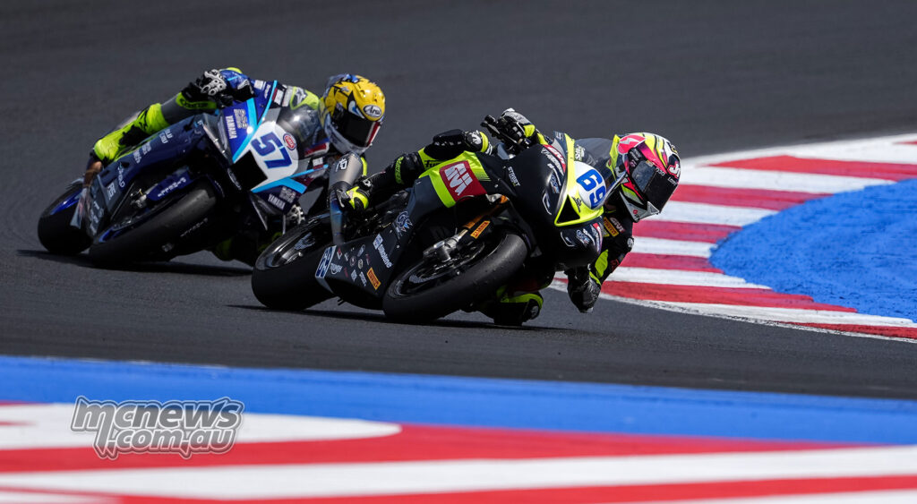 Tom Booth-Amos leading Aldi Satya Mahendra during their WorldSSP Race 2 battle at Misano.