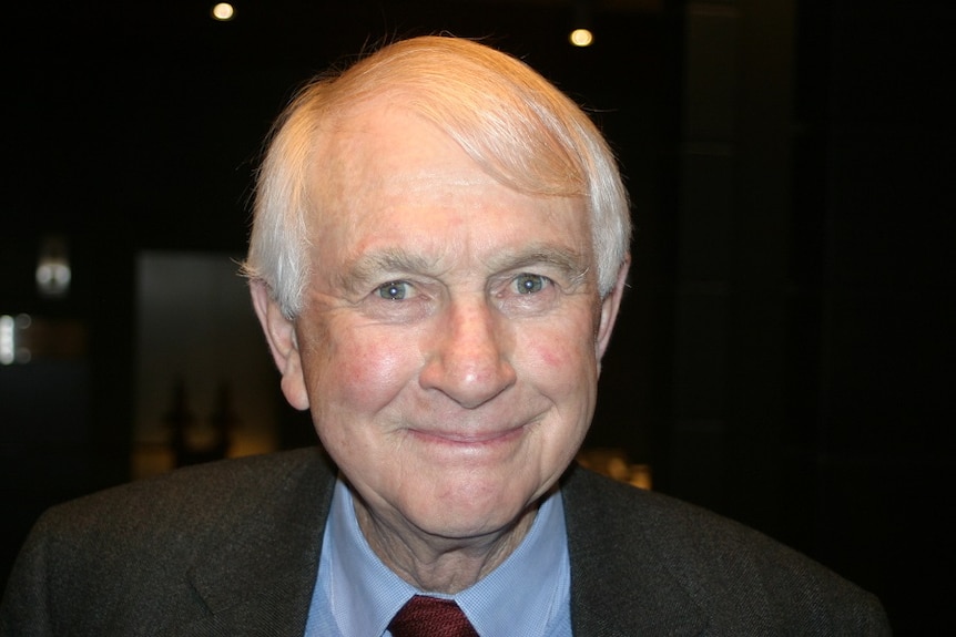 A close up of a man in his 80s.
