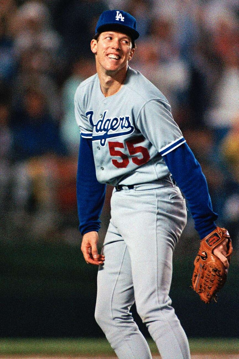 FILE - Los Angeles Dodgers Pitcher Orel Hershiser is all smiles as he watches the final out during his record setting performance on Oct. 3, 1988 in San Diego. (AP Photo/Lenny Ignelzi, file)