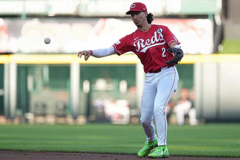 Cincinnati Reds second baseman Edwin Arroyo throws to first base for an out during the third inning of a baseball game against the Kansas City Royals, Tuesday, June 2, 2026, in Cincinnati. (AP Photo/Kareem Elgazzar)