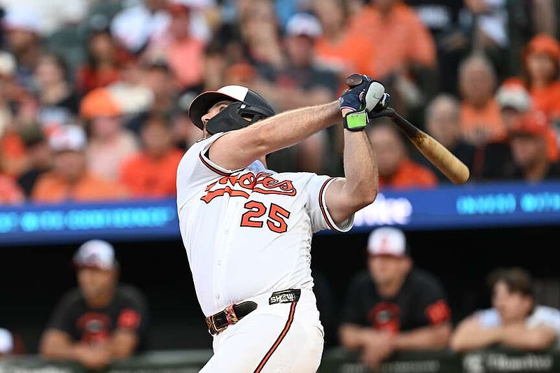 Baltimore Orioles' Pete Alonso follows through on a sacrifice fly against the Seattle Mariners in the third inning of a baseball game, Monday, June 8, 2026, in Baltimore. (AP Photo/Gail Burton)