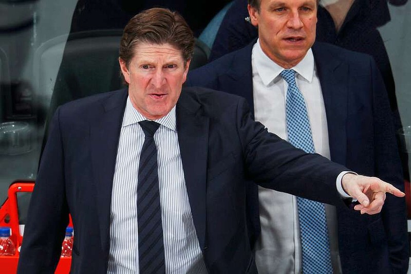FILE - Toronto Maple Leafs head coach Mike Babcock directs his team against the Colorado Avalanche in the third period of an NHL hockey game, Feb. 12, 2019, in Denver. (AP Photo/David Zalubowski, File)