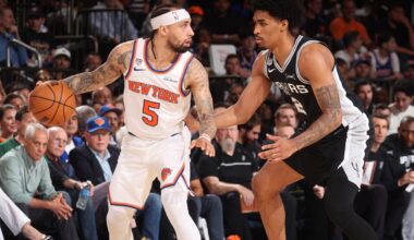 Jose Alvarado is guarded by Dylan Harper