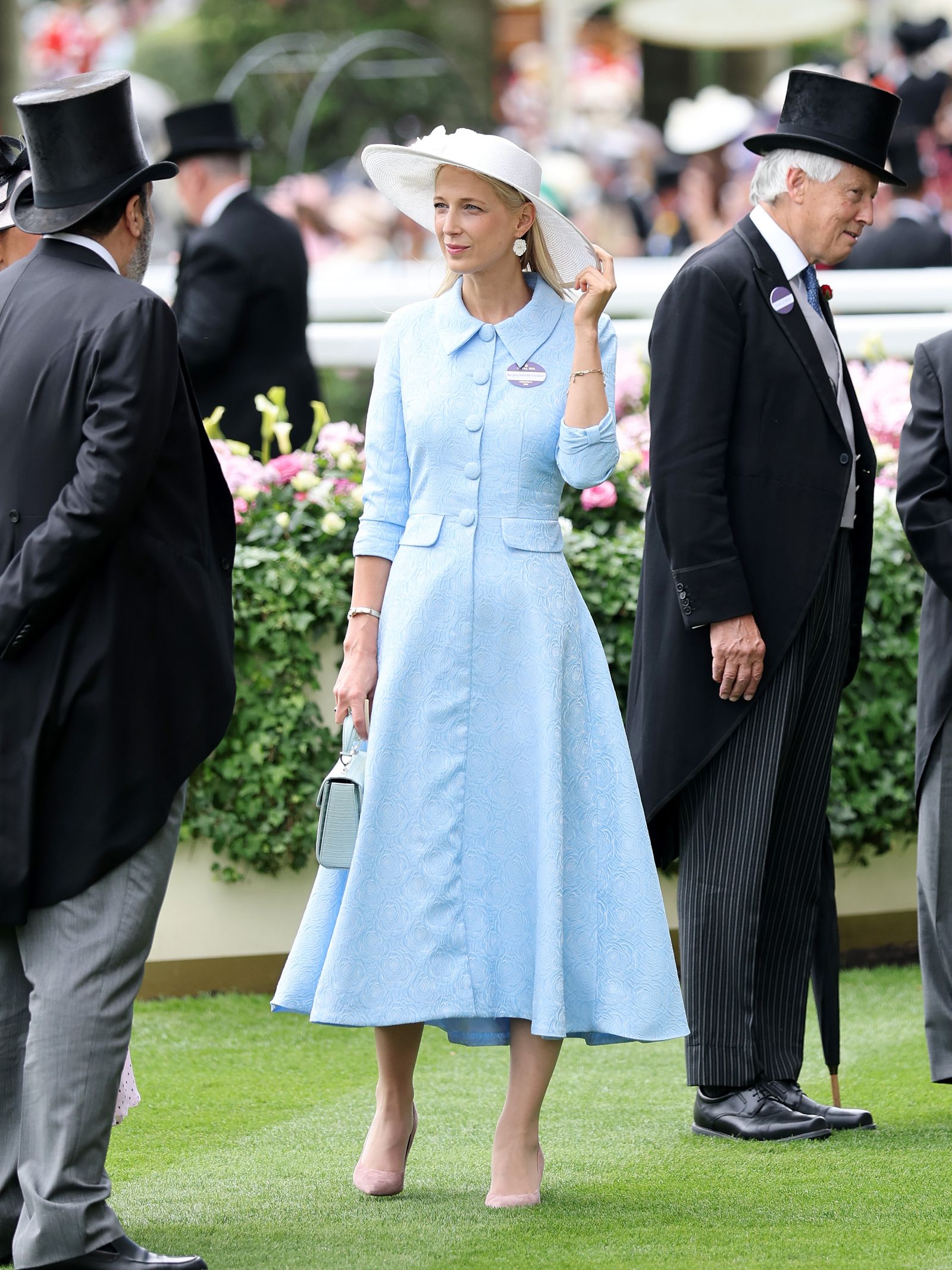 Image may contain Lady Gabriella Kingston Person Adult Clothing Coat and Hat