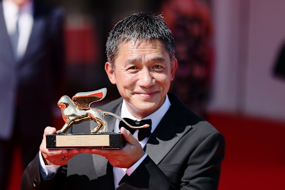 Tony Leung with his Golden Lion for Lifetime Achievement.