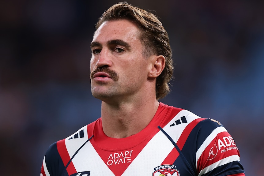 Connor Watson warms up ahead of a Sydney Roosters' NRL match in 2026.