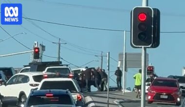 Motorcyclist who was trapped under car in Brisbane collision says bystanders saved his life