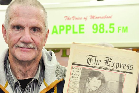 Apple 98.5 FM founder David Steele pictured in 2016 holding an article about himself published in 1986 in the lead-up to the first test broadcast of the then 3APL.