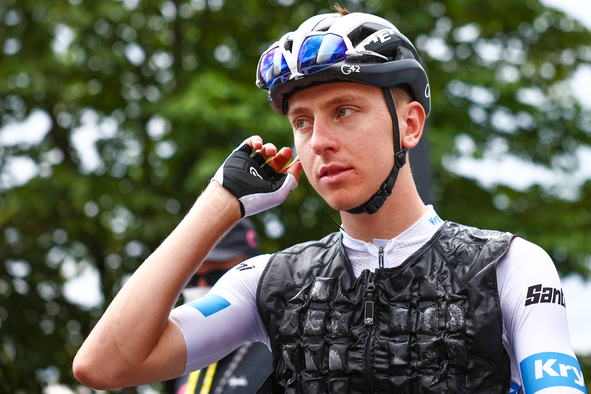 UAE Team Emirates' Slovenian rider Tadej Pogacar wearing a cooling vest filled with ice packs over his best young rider's white jersey awaits the start of the 14th stage of the 110th edition of the Tour de France cycling race, 152 km between Annemasse and Morzine, in Annemasse, on July 15, 2023. (Photo by Anne-Christine POUJOULAT / AFP) (Photo by ANNE-CHRISTINE POUJOULAT/AFP via Getty Images)