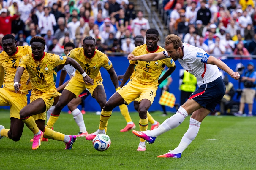 Four Ghana defenders watch Harry Kane
