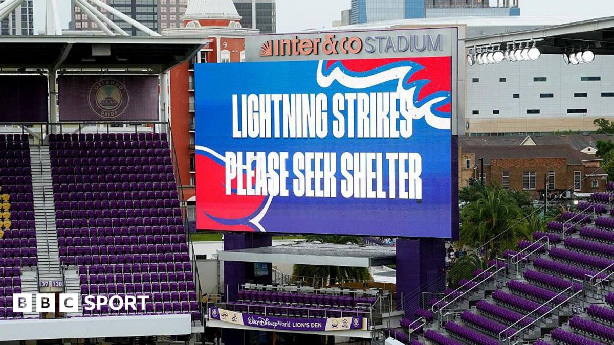 Big screen saying 'lightning strikes please seek shelter'
