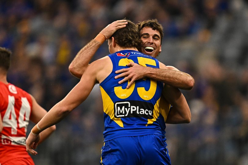 Cripps celebrating a goal.