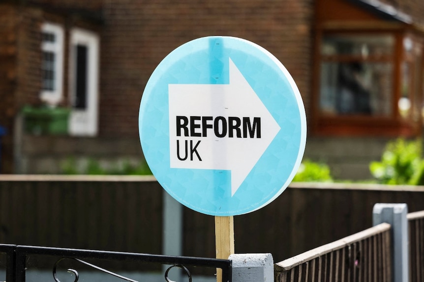 A sign in a garden saying "Reform UK" on it.
