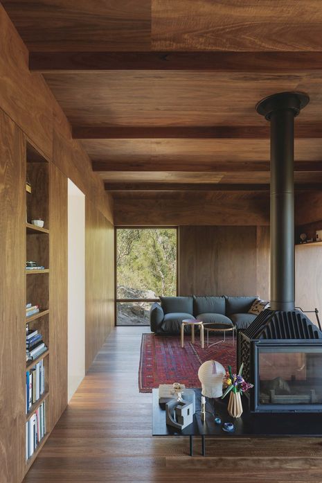 The lower- ground level is one long space containing living, kitchen and dining zones.