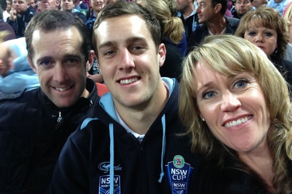 Isaah Yeo with his parents, Justin and Amy, back in 2014.