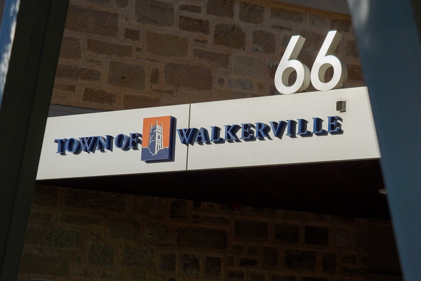 A sign for Town of Walkerville with a 66 on top of a verandah