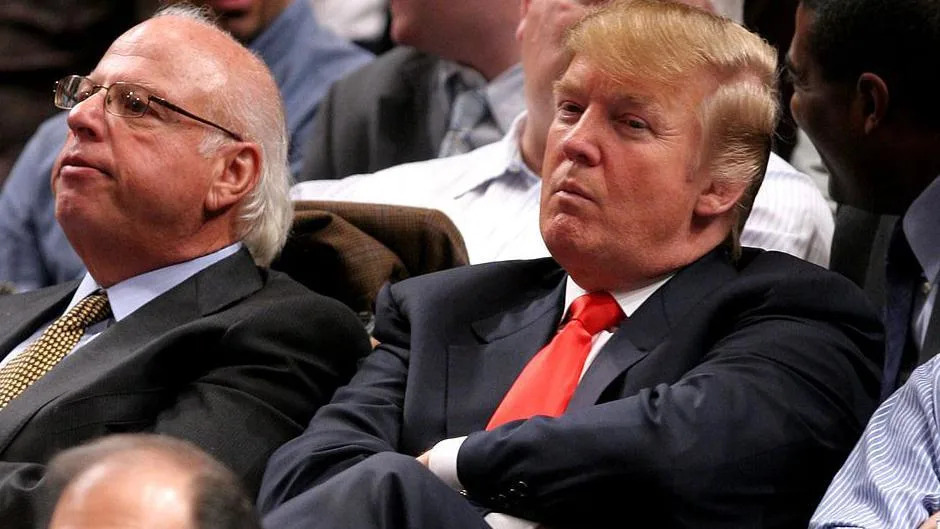 Trump sitting in the crowd at a Knicks game in 2006
