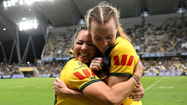 Kennedy Cherrington and Tamika Upton embrace.