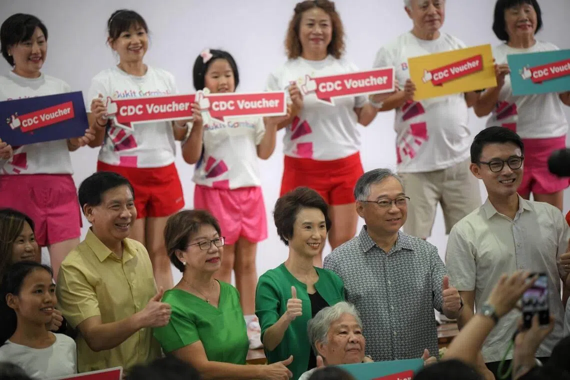 (From left) South West CDC vice-chairman Ang Wei Neng, Central Singapore District Mayor Denise Phua, South West District Mayor Low Yen Ling, DPM Gan Kim Yong and North East District Mayor Baey Yam Keng at the launch of the CDC voucher scheme on June 11.