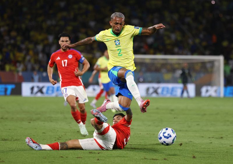 Football: Soccer-Brazil lose injured Wesley from World Cup squad, call up Ederson