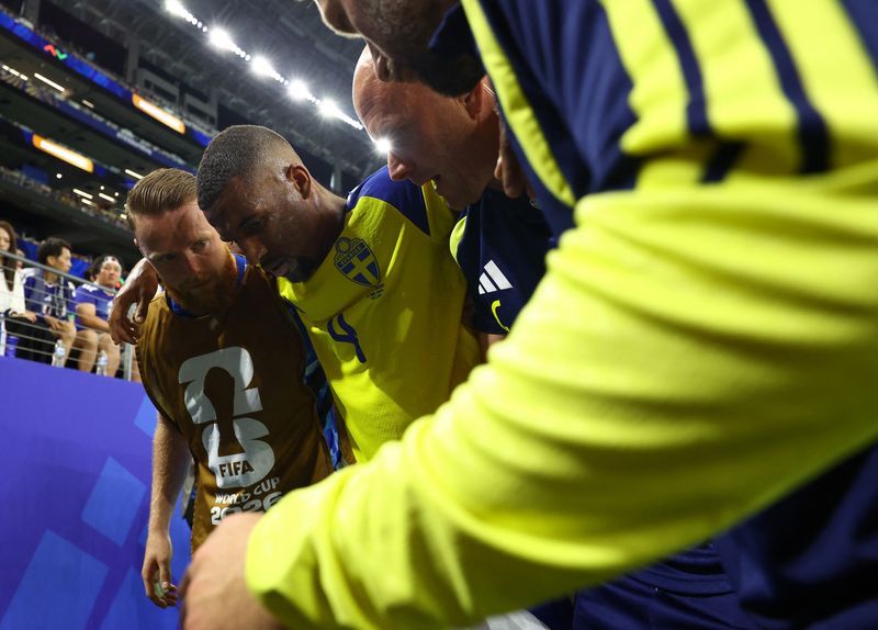 Football: Soccer-Sweden's Hien out of World Cup after suffering hamstring injury against Japan