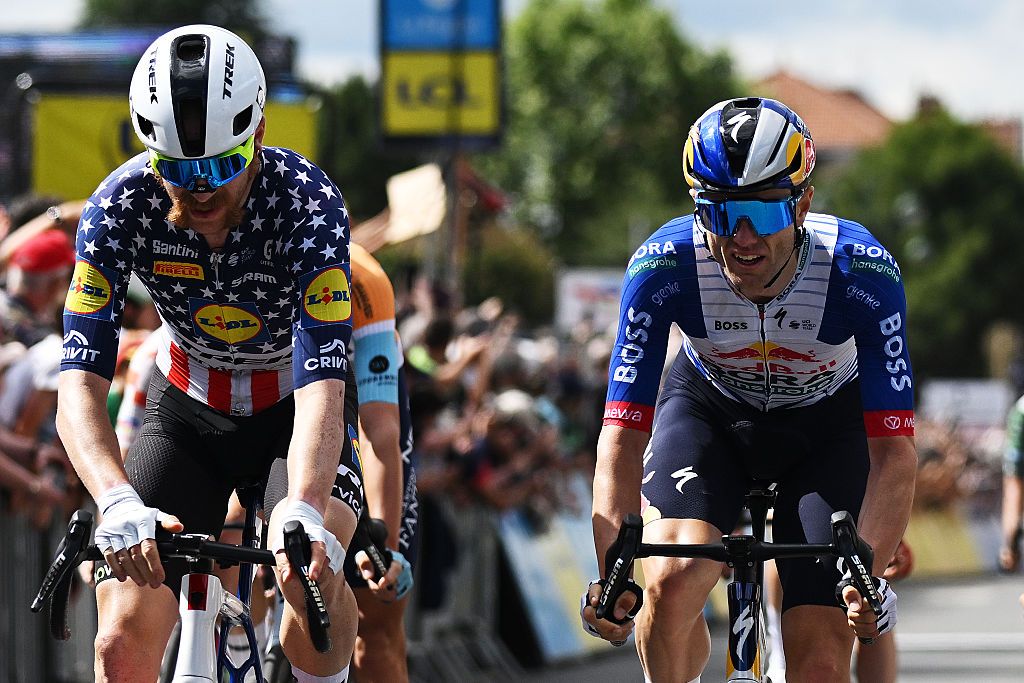 MONTROND-LES-BAINS, FRANCE - JUNE 10: (L-R) Stage winner Quinn Simmons of United States and Team Lidl - Trek and Finn Fisher-Black of New Zealand and Team Red Bull - BORA - hansgrohe on second place cross the finish line during the 78th Tour Auvergne-Rhone-Alpes 2026, Stage 4 a 167.4km stage from Le Puy-en-Velay to Montrond-les-Bains / #UCIWT / on June 10, 2026 in Montrond-les-Bains, France. (Photo by Dario Belingheri/Getty Images)
