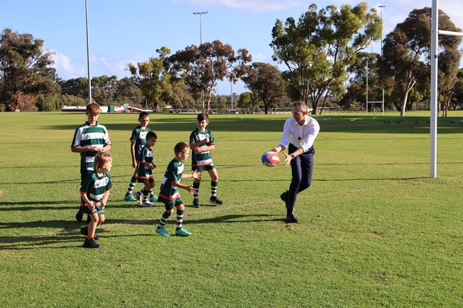 Landsdale MLA Daniel Pastorelli playing with Wanneroo Rugby Union Club’s “RooPups” junior players.