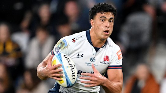 DUNEDIN, NEW ZEALAND - MAY 09: Joseph-Aukuso Suaalii of the NSW Waratahs charges forward during the round 13 Super Rugby match between Highlanders and NSW Waratahs at Forsyth Barr Stadium, on May 09, 2026, in Dunedin, New Zealand. (Photo by Joe Allison/Getty Images)