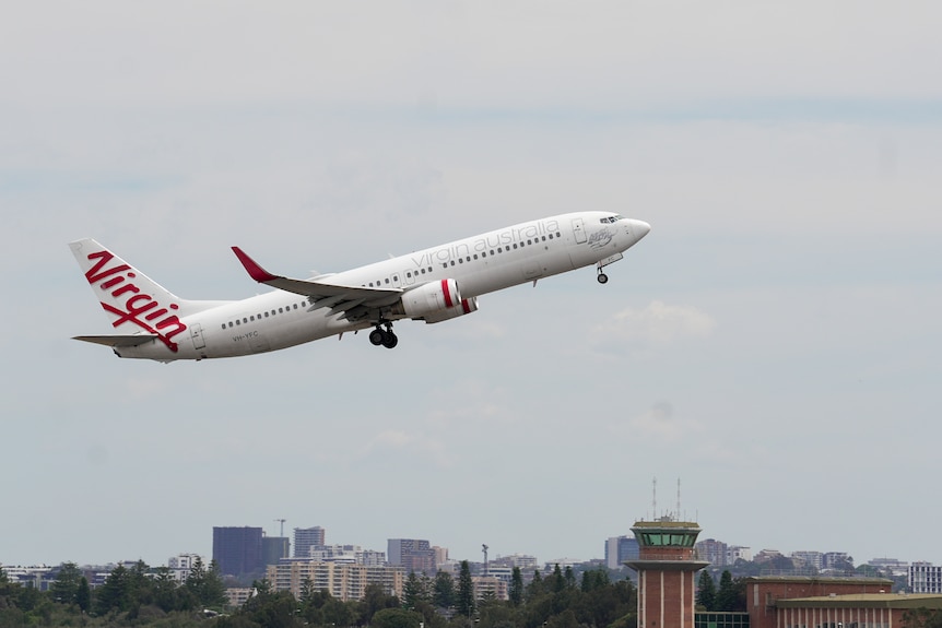 A Virgin branded plane taking off.