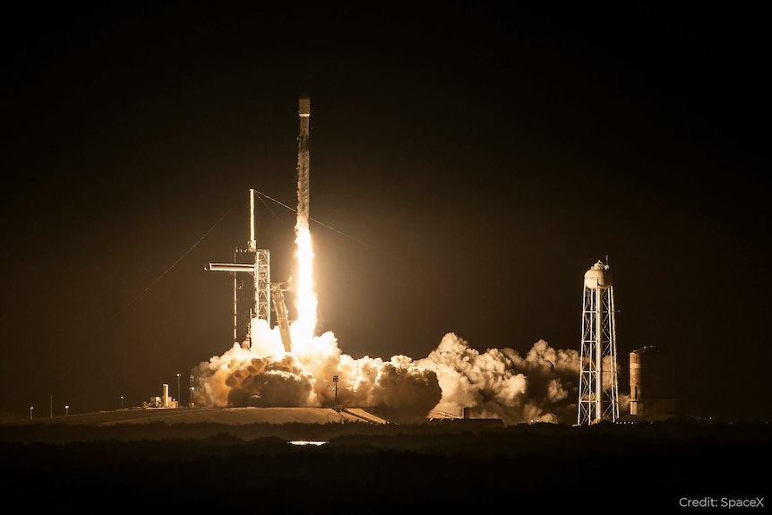 A rocket being launched at night