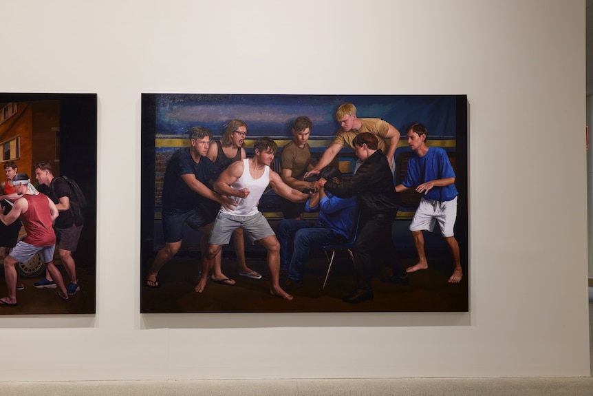 A painting of an angry mob of young white men surrounding a seated dark-skinned person.