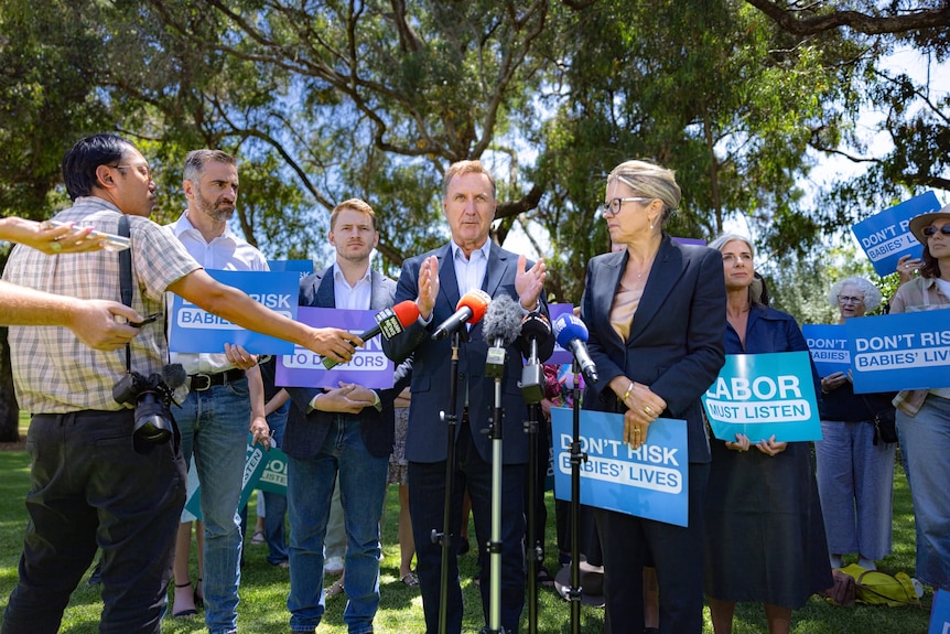 Jonathan Huston speaking at a press conference with other WA Liberal MPs.