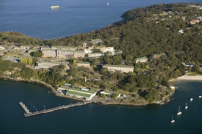 Aerial view of a naval site along the harbour.