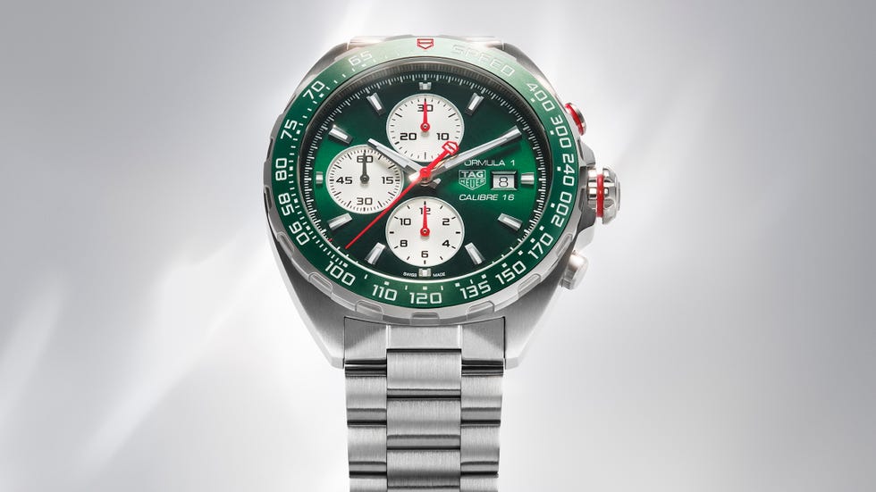 luxury chronograph watch with a green dial and stainless steel strap luxury chronograph watch with a green dial and stainless steel strap